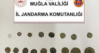 ELİNDEKİ SİKKELERİ SATAMADAN JANDARMAYA YAKALANDI