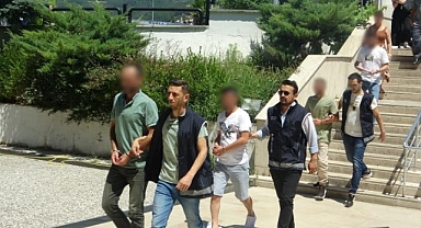 GÖÇMEN KAÇAKÇILARI TUTUKLANDI