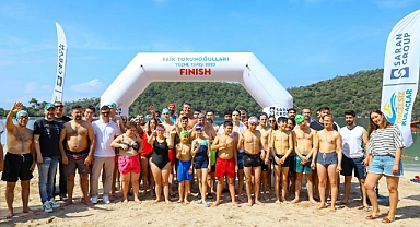 ÖLÜDENİZ'DE ENGELLİ GENÇLER KIYASIYA YARIŞTI
