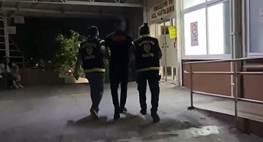 AĞACA ÇIKARAK MEŞALELİ ŞOV YAPAN ŞAHIS GÖZALTINA ALINDI