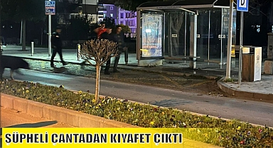 ŞÜPHELİ ÇANTADAN KIYAFET ÇIKTI