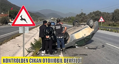 KONTROLDEN ÇIKAN OTOMOBİL DEVRİLDİ