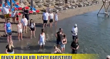 DENİZE ATILAN KÜL İLÇEYİ KARIŞTIRDI