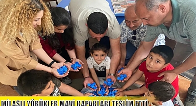 MİLASLI YÖRÜKLER MAVİ KAPAKLARI TESLİM ETTİ