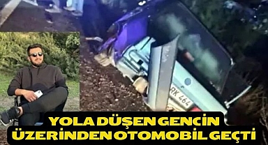 Yola düşen gencin üzerinden otomobil geçti