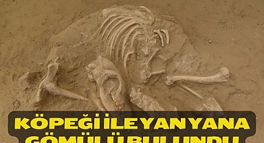 Köpeği ile yan yana gömülü bulundu