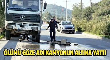 Ölümü göze adı kamyonun altına yattı