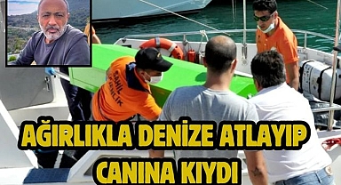 Ağırlıkla denize atlayıp canına kıydı