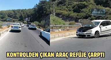 Kontrolden çıkan araç refüje çarptı
