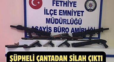 Şüpheli çantadan silah çıktı