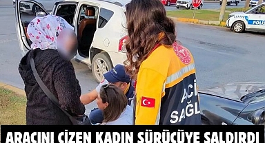 Aracını Çizen Kadın Sürücüye Saldırdı