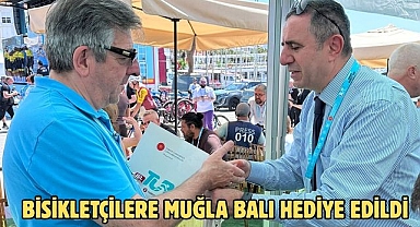 BİSİKLETÇİLERE MUĞLA BALI HEDİYE EDİLDİ