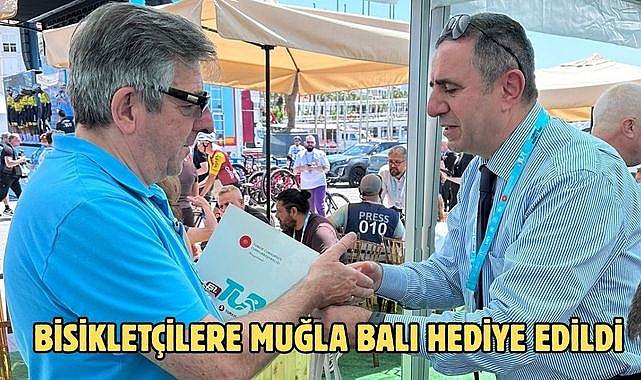BİSİKLETÇİLERE MUĞLA BALI HEDİYE EDİLDİ